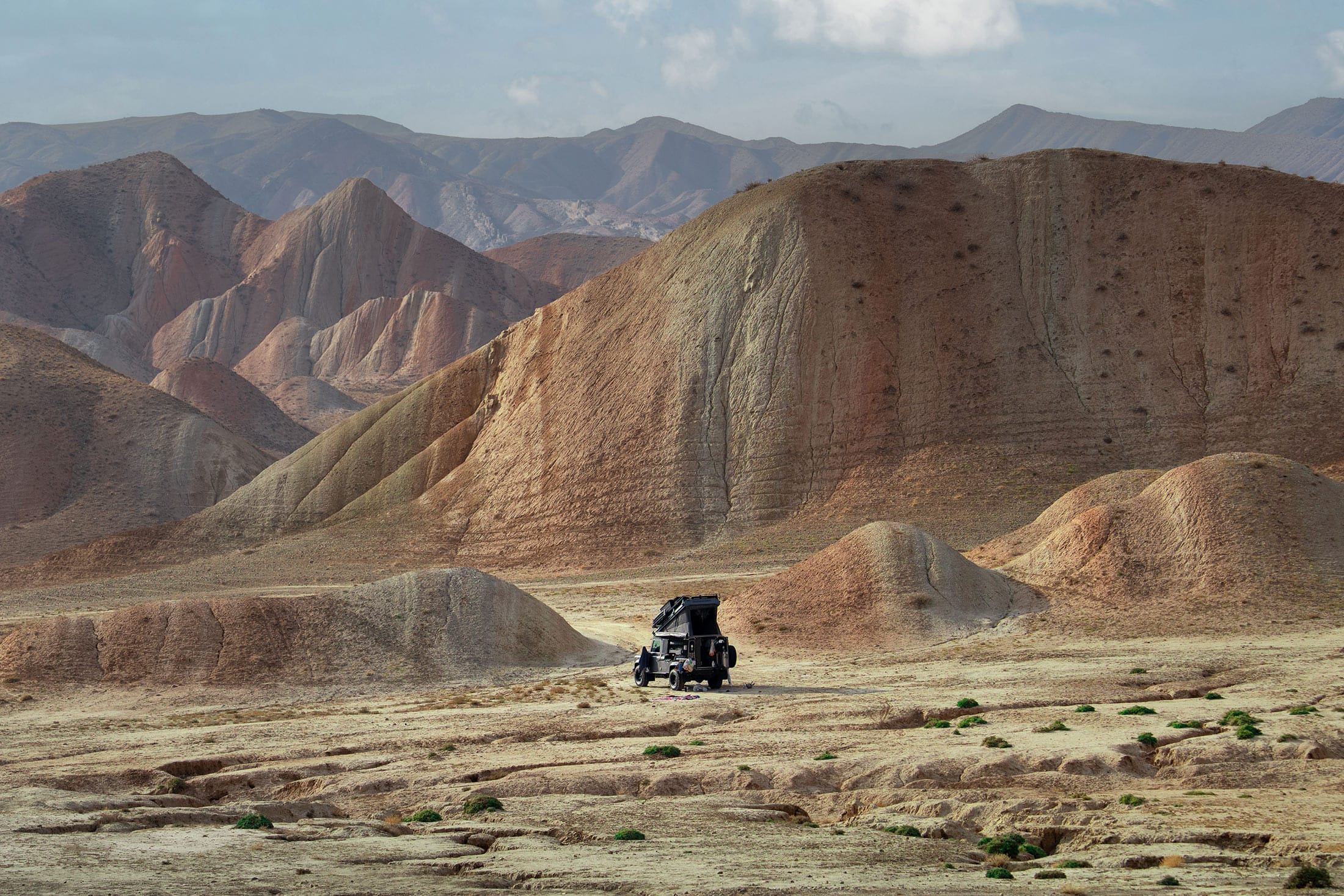 camp at the rainbow mountains in iran