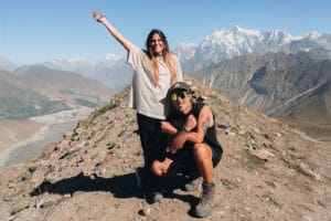couple on top of mountain-rush-lake-trek-pakistan