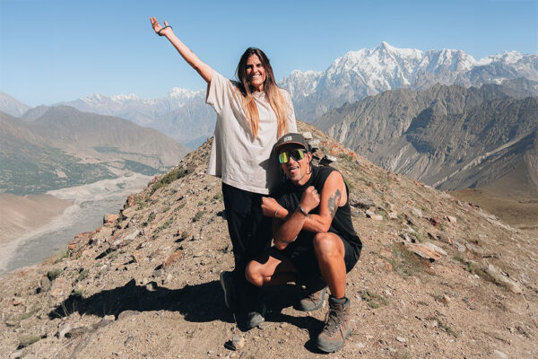 couple on top of mountain-rush-lake-trek-pakistan couple on top of mountain-rush-lake-trek-pakistan