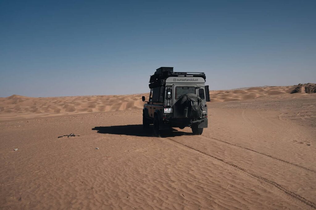 driving through the sand of the taklamakan desert