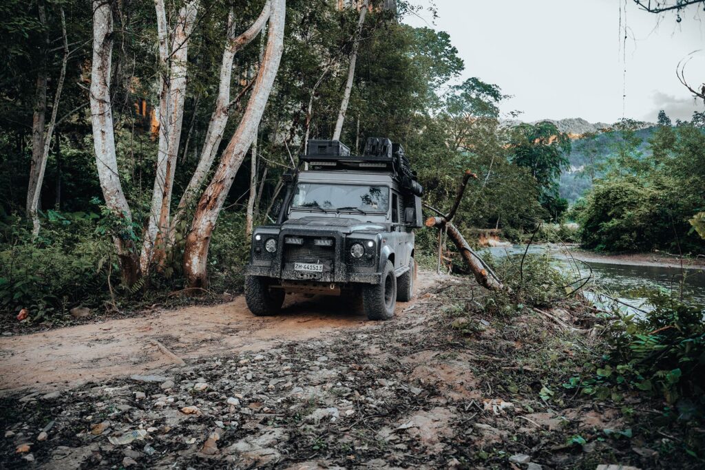 overlanding-laos-jungle-4x4-landrover-defender-nong-khiaw driving our landrover defender through the jungle of nong khiaw in Laos