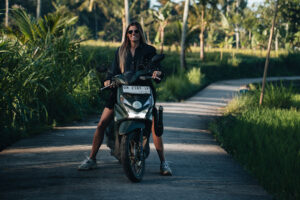 stephanie is riding a scooter on lombok