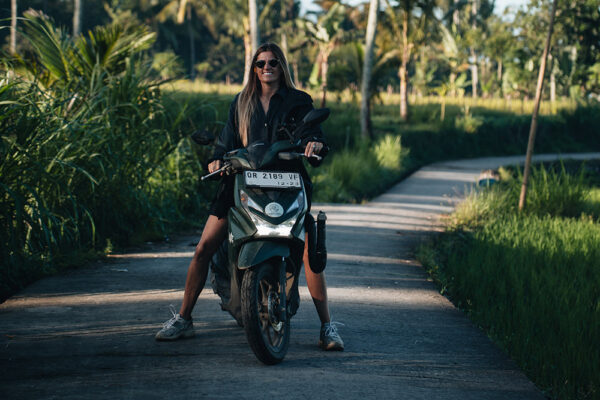 stephanie is riding a scooter on lombok